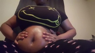 Ebony with Huge Boobs Belly Rubs