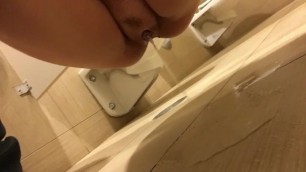 Teen Pussy Pisses all over Floor of Public Bathroom